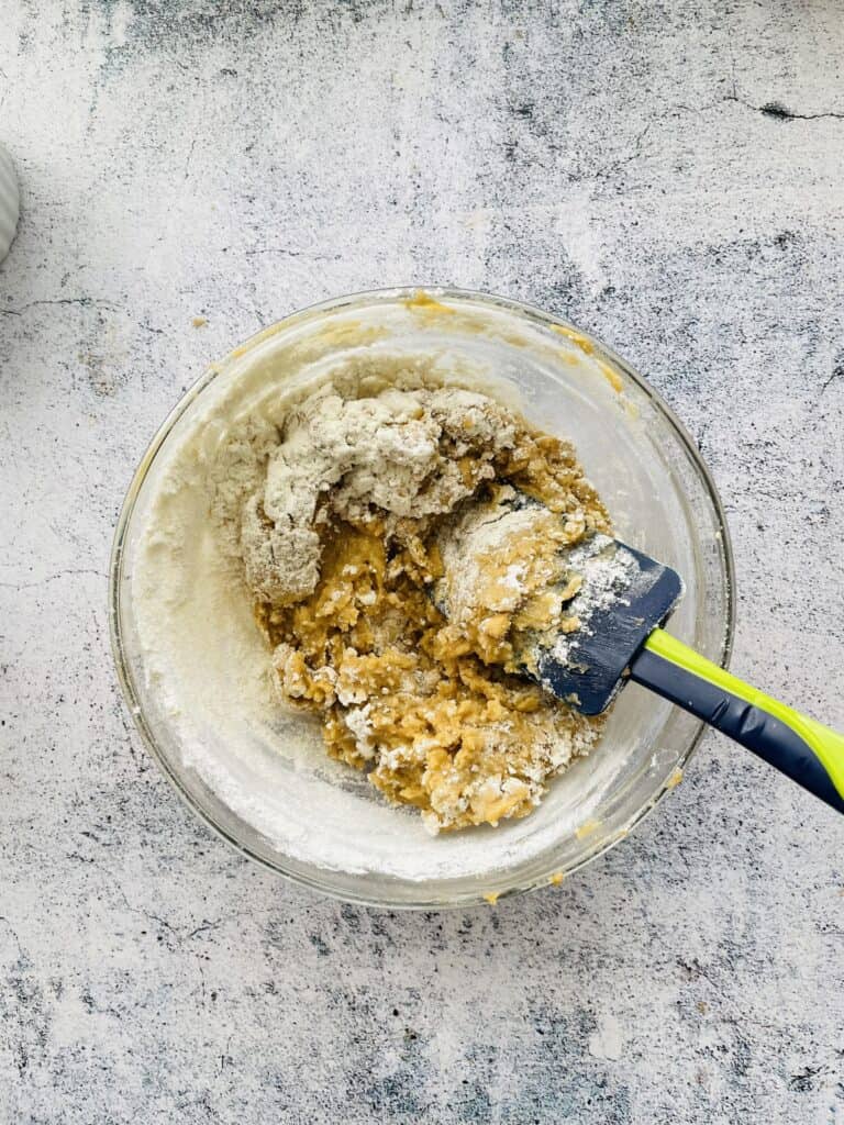 Mix flour into the butter and cream mixture