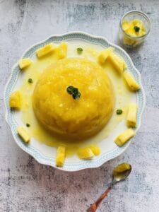 Pineapple jelly with mint garnish